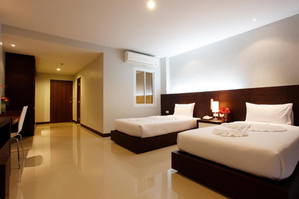 Nize Hotel - Sha Plus Phuket Pokoj fotografie