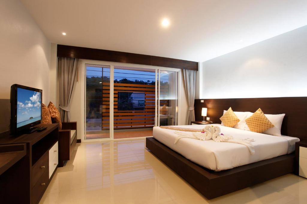 Nize Hotel - Sha Plus Phuket Pokoj fotografie